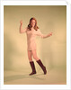 1960s Woman Dancer In Tan Dress And Boots White Fishnet Stockings by Anonymous