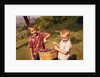1960s Two Laughing Boys Carrying Basket Of Harvested Grapes by Anonymous