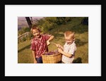 1960s Two Laughing Boys Carrying Basket Of Harvested Grapes by Anonymous