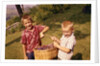 1960s Two Laughing Boys Carrying Basket Of Harvested Grapes by Anonymous