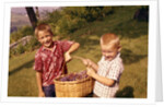 1960s Two Laughing Boys Carrying Basket Of Harvested Grapes by Anonymous