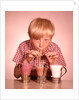 1950s 1960s Boy Drinking Three Milkshakes Through A Straw At Same Time by Anonymous
