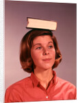 1960s 1970s Young Woman Girl Balancing Book On Head by Anonymous
