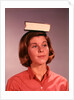 1960s 1970s Young Woman Girl Balancing Book On Head by Anonymous