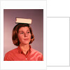 1960s 1970s Young Woman Girl Balancing Book On Head by Anonymous