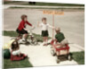 1950s Boys And Girls Outdoor With Tricycle And Wagon Playing Traffic With Police Stop Sign Americana by Anonymous