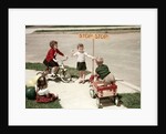 1950s Boys And Girls Outdoor With Tricycle And Wagon Playing Traffic With Police Stop Sign Americana by Anonymous
