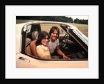 1970s Young Couple Man Woman Sitting Cockpit Of Chevrolet Corvette Car Sports by Anonymous