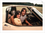 1970s Young Couple Man Woman Sitting Cockpit Of Chevrolet Corvette Car Sports by Anonymous