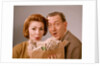 1960s Surprised Happy Couple Man Woman With Grocery Bag Filled With Money by Anonymous