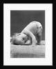 1940s Baby Bending Down With Head On Blanket by Anonymous