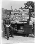 1940s Boy Sitting At Corner Newsstand Writing In Notepad by Anonymous