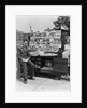 1940s Boy Sitting At Corner Newsstand Writing In Notepad by Anonymous
