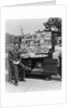 1940s Boy Sitting At Corner Newsstand Writing In Notepad by Anonymous