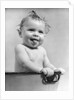 1940s 1930s Wet Baby Sitting In Tub Sticking Out Tongue by Anonymous