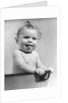1940s 1930s Wet Baby Sitting In Tub Sticking Out Tongue by Anonymous