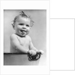 1940s 1930s Wet Baby Sitting In Tub Sticking Out Tongue by Anonymous