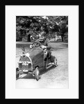 1930s Boy Driving Home Built Race Car Holding Steering Wheel by Anonymous