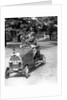 1930s Boy Driving Home Built Race Car Holding Steering Wheel by Anonymous