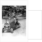 1930s Boy Driving Home Built Race Car Holding Steering Wheel by Anonymous