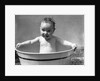 1930s Wet Baby In Washtub Sticking Out Tongue by Anonymous