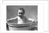 1930s Wet Baby In Washtub Sticking Out Tongue by Anonymous
