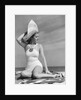 1940s Woman In White Bathing Suit On Beach Wearing Big Straw Hat by Anonymous