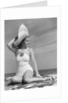 1940s Woman In White Bathing Suit On Beach Wearing Big Straw Hat by Anonymous