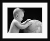 1940s Baby With Hands On Globe Looking At The Earth by Anonymous