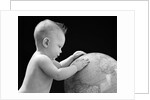 1940s Baby With Hands On Globe Looking At The Earth by Anonymous