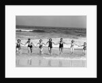 1930s Group 7 People Holding Hands Running Out Of Surf Onto Beach by Anonymous