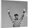 1950s Football Referee Making Touchdown Signal by Anonymous