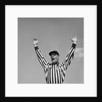 1950s Football Referee Making Touchdown Signal by Anonymous