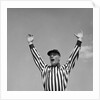 1950s Football Referee Making Touchdown Signal by Anonymous