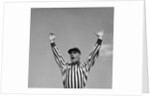 1950s Football Referee Making Touchdown Signal by Anonymous