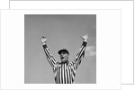 1950s Football Referee Making Touchdown Signal by Anonymous