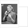 1950s Woman In Chair About To Sneeze Sneezing Handerchief In One Hand Cold Flu Allergy Cough Coughing by Anonymous