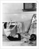 1940s Woman Housewife Falling From Step Ladder In Kitchen While Washing Window by Anonymous