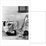 1940s Woman Housewife Falling From Step Ladder In Kitchen While Washing Window by Anonymous