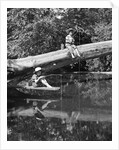 1940s 1950s Pair Of Boys In Straw Hats and Cuffed Jeans Fishing In Stream by Anonymous