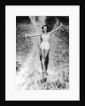 1950s Woman In Two Piece Bathing Suit Aquaplaning Water Skiing by Anonymous