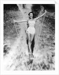 1950s Woman In Two Piece Bathing Suit Aquaplaning Water Skiing by Anonymous