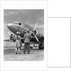 1940s Rear View Of Boy and Girl Standing Together Looking At Propeller Airplane Outdoor by Anonymous