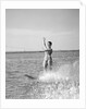 1960s Woman Water Skiing Waving With One Hand by Anonymous