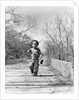 1940s Boy Walking Down Country Road With Can Of Worms And Fishing Pole by Anonymous