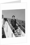 1960s Businessman Deplaning From Airplane Wearing Hat And Carrying Overcoat And Briefcase by Anonymous
