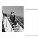 1960s Businessman Deplaning From Airplane Wearing Hat And Carrying Overcoat And Briefcase by Anonymous