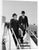 1960s Two Business Men Briefcase Exit Airplane Steps by Anonymous