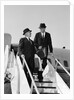 1960s Two Business Men Briefcase Exit Airplane Steps by Anonymous