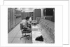 1960s 1970s Computer Room Mission Control Center Houston Texas 2 Men Sitting At Console by Anonymous